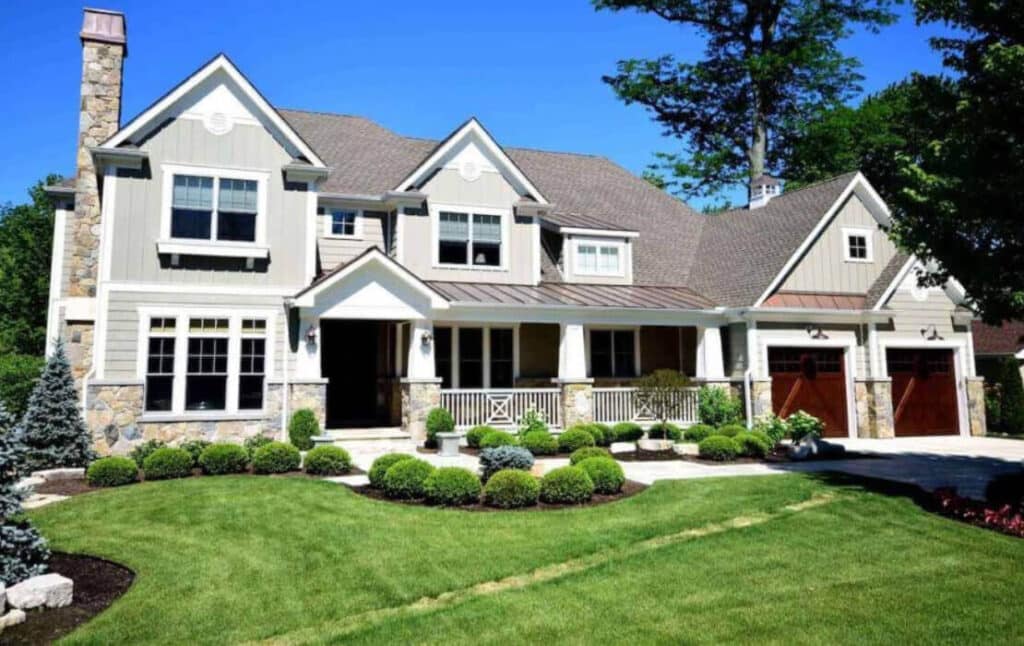 Beautiful suburban home with manicured lawn and garden.