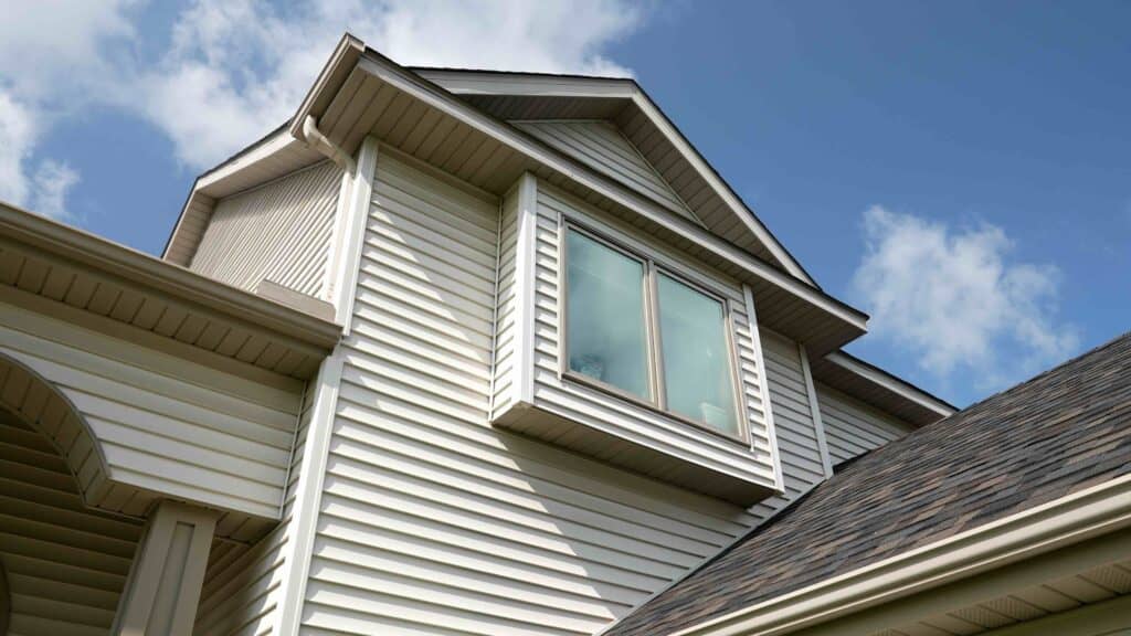 Modern house with white vinyl siding