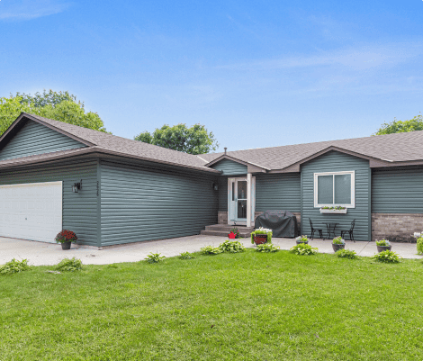 Modern suburban house with lawn and driveway