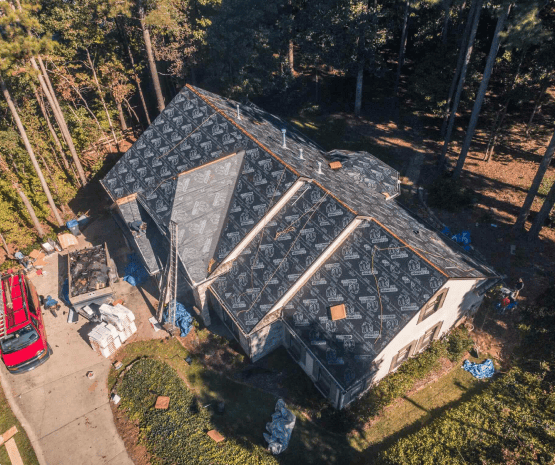 Aerial view of house roof under construction.