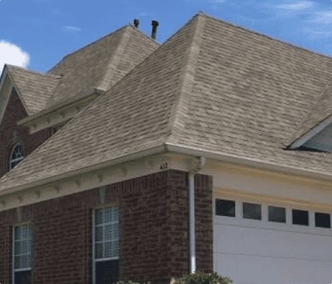 Brick house with gable roof and garage