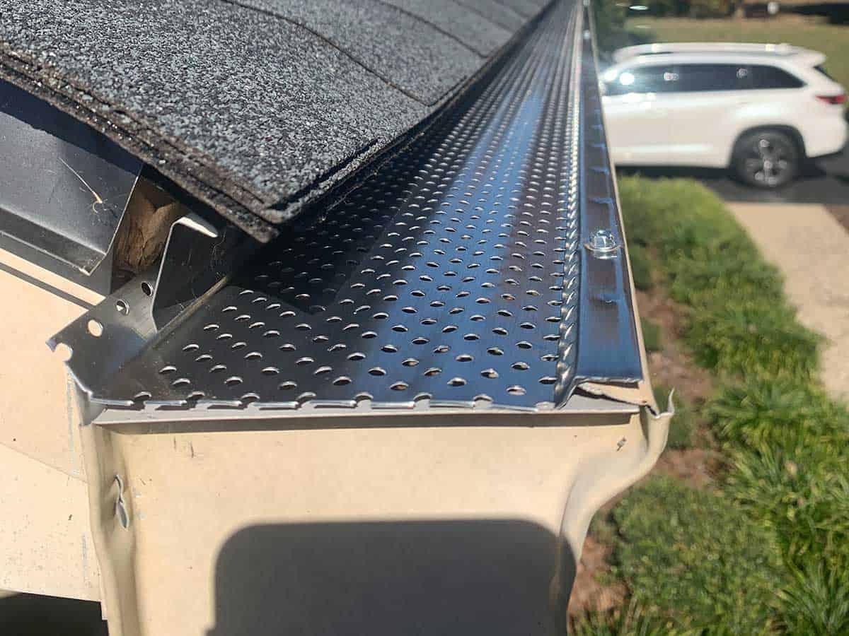 Close-up of rain gutter with leaf guard