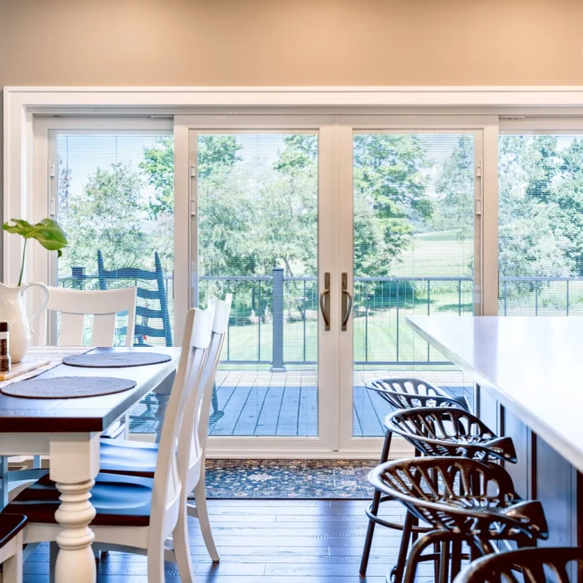 Bright dining area with patio door view.