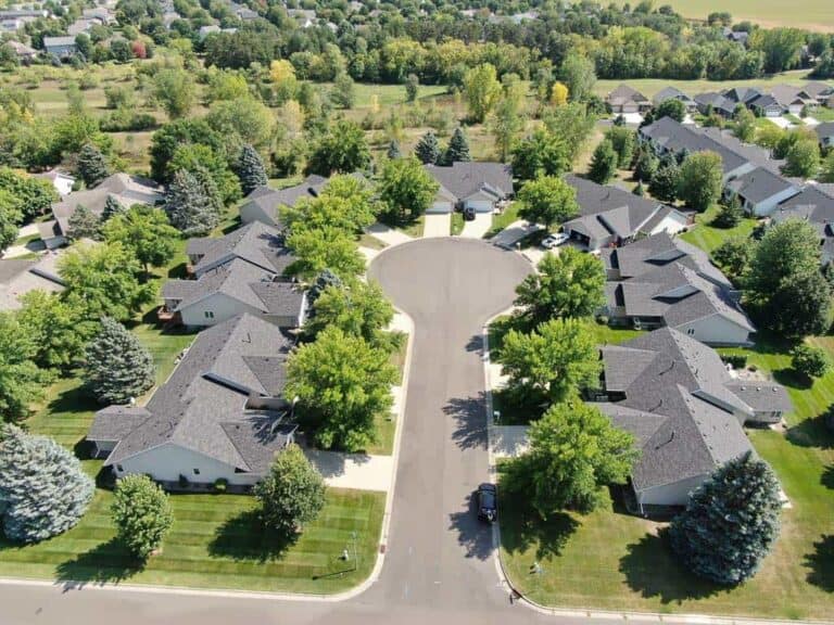 Aerial view of suburban cul-de-sac with houses.