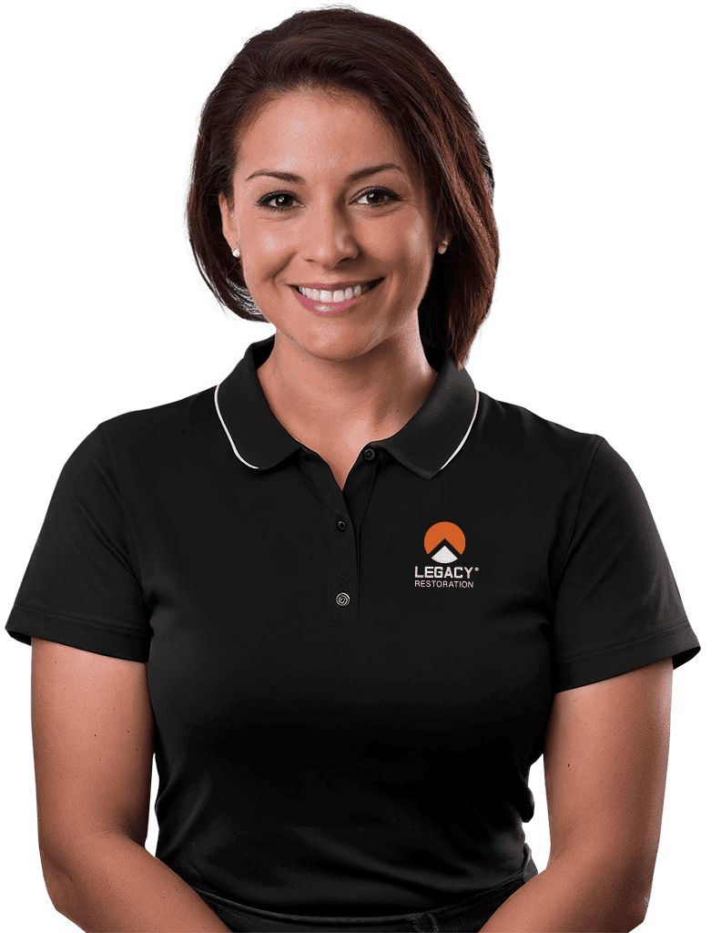 Smiling woman in Legacy Restoration polo shirt