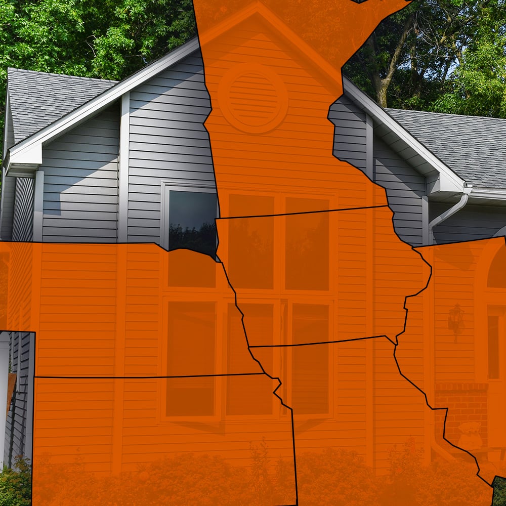 Illinois state outline over suburban home exterior