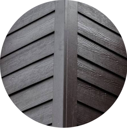 Modern dark wood siding corner detail