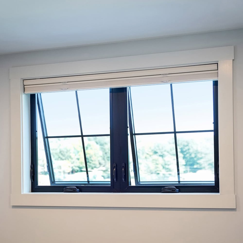 Modern black-framed window partially open indoors