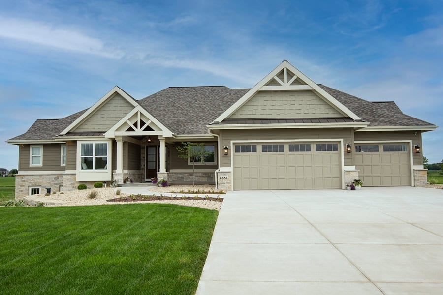 Modern single-story suburban home with three-car garage