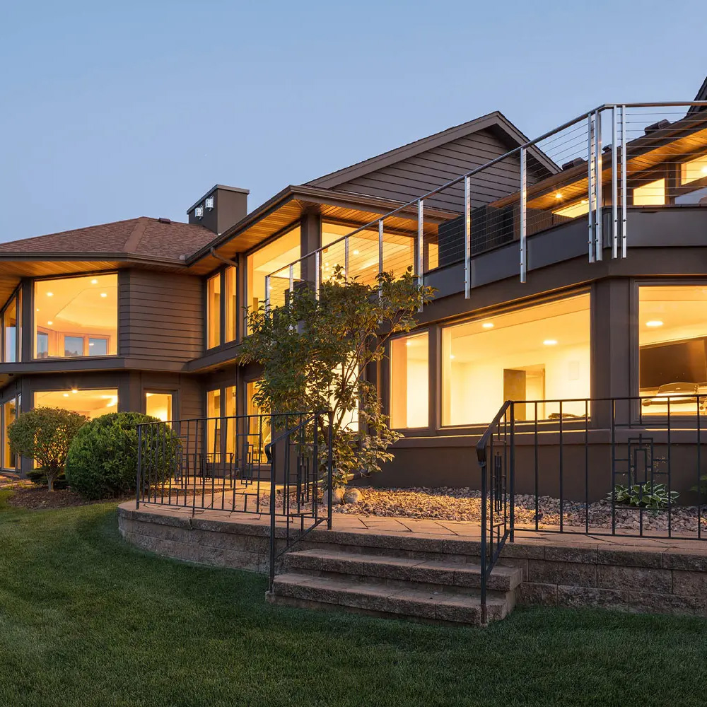Modern two-story home exterior at dusk